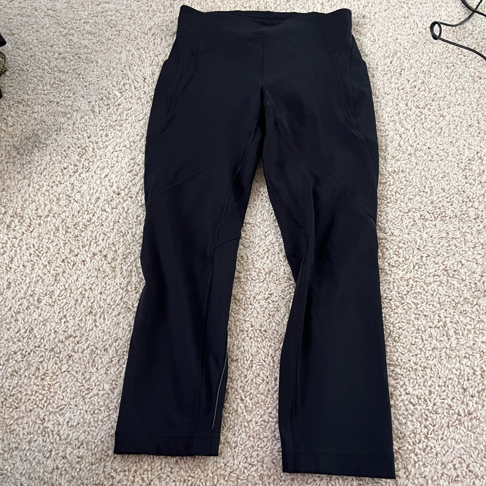 Black cropped compression leggings thigh pockets, draw string & waistband pocket